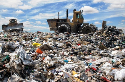 The bulldozer on a garbage dump